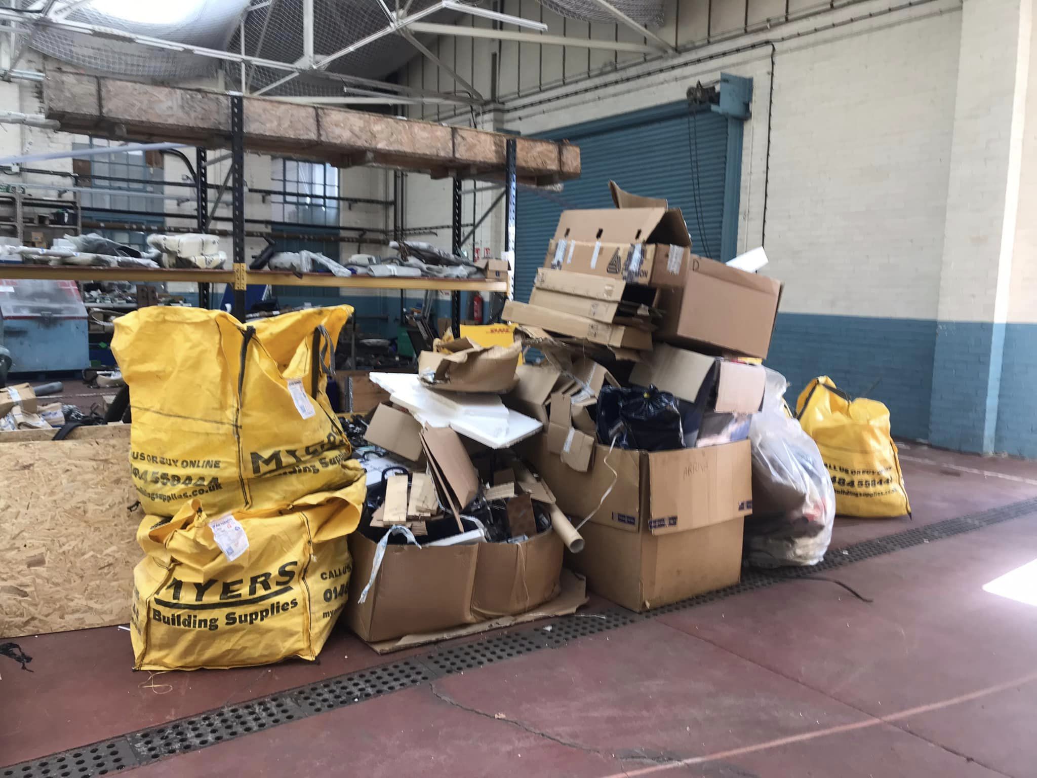 Image of a heap of rubbish awaiting a waste removal in a commercial warehouse